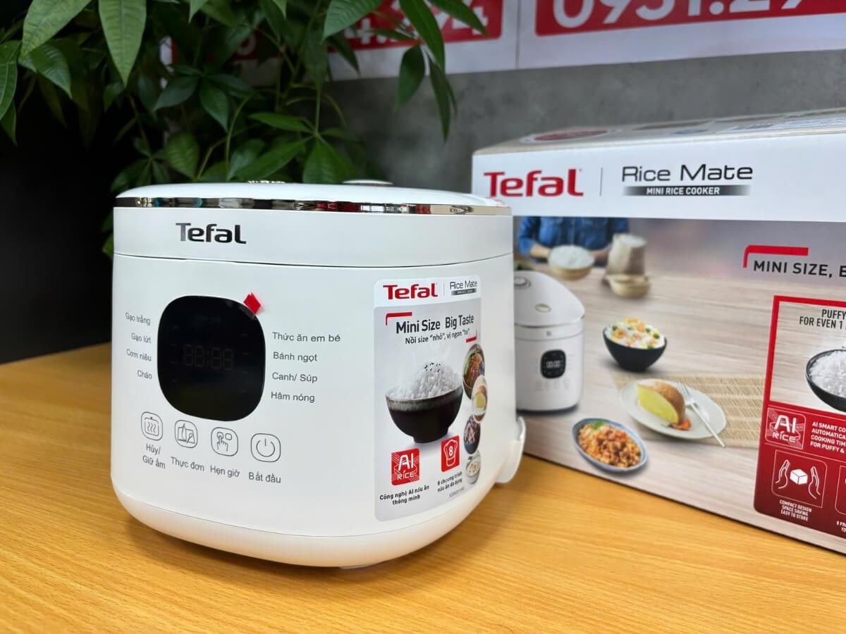 a white rice cooker on a table